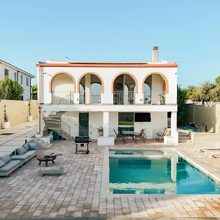 With Heated Pool